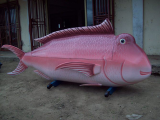 Illustration for article titled The Awesome Animal-Shaped Coffins of Ghana's Paa Joe
